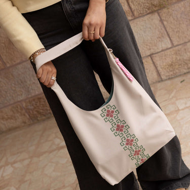 KUVRD Folklore Bone Tatreez bag, interior and strap detail