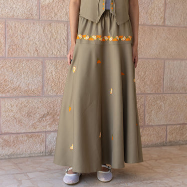 KUVRD Jaffa Orange Tatreez Skirt with vibrant handmade Palestinian embroidery