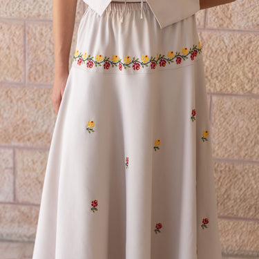 Model wearing the KUVRD Floral Blossom Tatreez Skirt, full-length