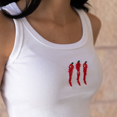Model wearing the KUVRD Filfil Tatreez Tank, front view