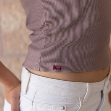 Model wearing the KUVRD Enab Tatreez Tank, front view