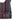 Colorful woven bag with geometric patterns on a white background