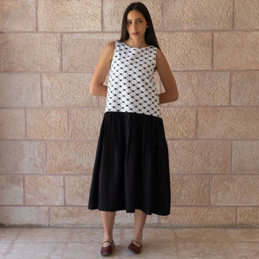 KUVRD Keffiyeh Dress in breathable linen with drop-waist silhouette