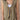 Model wearing the KUVRD Olive Tatreez Vest, layered styled look
